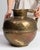 This 19th century jar from France is finished in brass. Its hammered detailing gives the piece a distinct, well-considered...