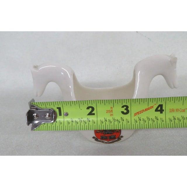 This charming small bowl is made of porcelain. This piece is stamped as being made by W.H. Goss, see pictures, and the...