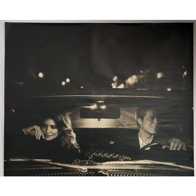 Date: 2024 Size: 47 x 68 inches About this poster : A tribute to Claude Lelouch’s film A Man and a Woman, CHANEL’s...