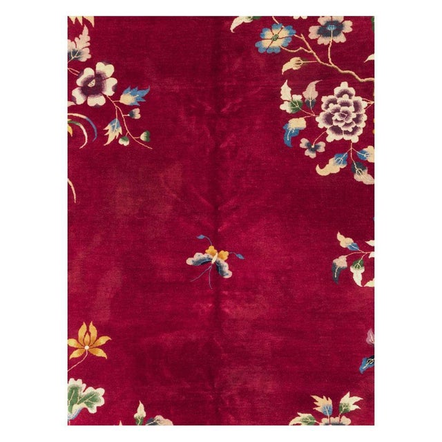 A vintage Chinese Art Deco room size carpet handmade during the mid-20th century. Measures: 9' 2" x 11' 9" Chinese Rugs &...