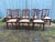 Set of Eight Vintage Chippendale Style Cherry Carved Dining Chairs. Well carved details, sturdy and comfortable Unmarked,...