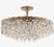A striking Trillion flush-mount chandelier by Visual Comfort Studio, featuring a radiant arrangement of precision-cut...