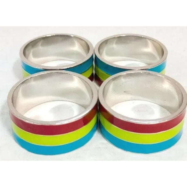 These napkin rings in the bright colors are enamel on stainless steel. They are festive and will give a touch of fun to...
