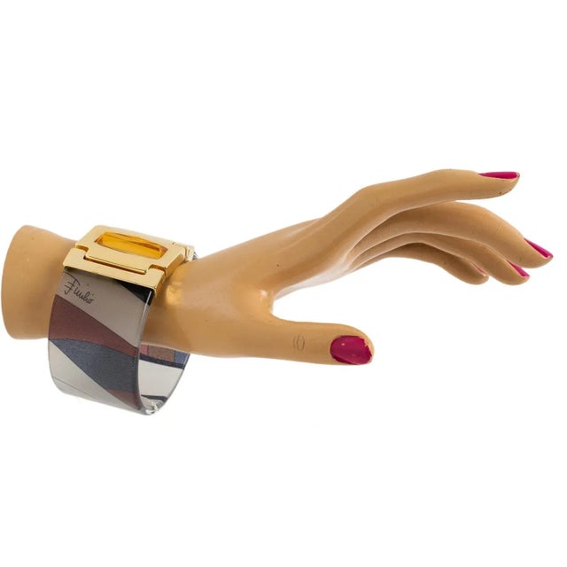 This is part of Chairish’s Costume Jewelry assortment. This superb chunky Emilio Pucci gilded metal, acrylic, and silk...