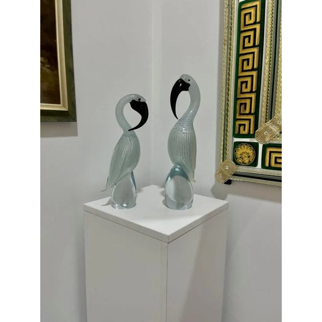 These exotic birds are hand formed at the Formia Furnace in Murano. Beautiful light blue coloring. Signed by Artist. Price...