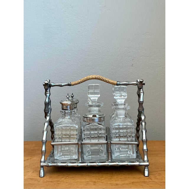 This exquisite late 19th-century Victorian cruet set by the renowned James Deakin & Sons of Sheffield is a masterclass in...