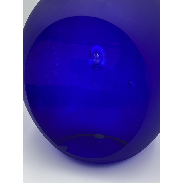 Blue art glass paperweight or bookend sculpture from Studio Åhus. Studio Åhus was a Swedish art glass studio founded in...