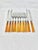Lovely vintage set of forks and knives. Four knives and six forks. Features a wonderful butterscotch colored Bakelite...