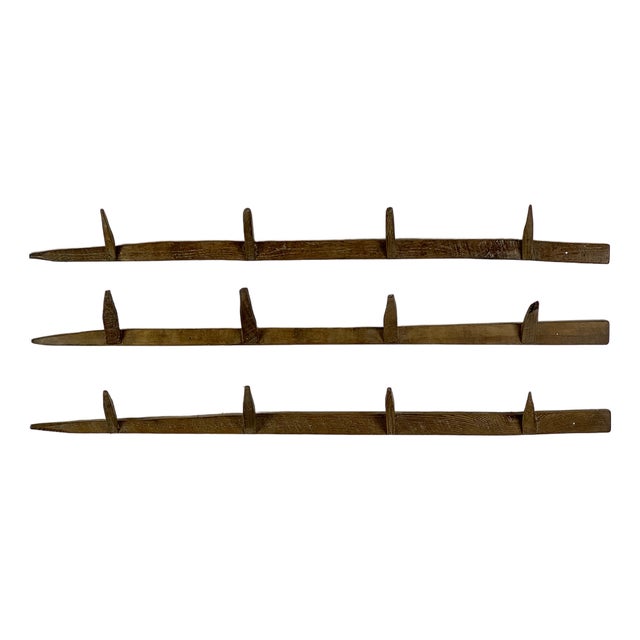 Unusual Vintage Set of 3 Wall Mounted Rustic Racks With Spike Hooks in Blond Wood For Sale
