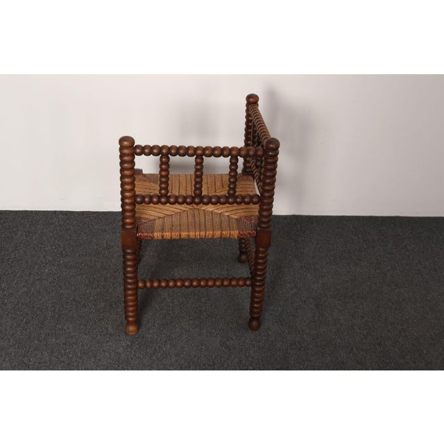 French Provincial Diminutive Antique French 19th Century Bobbin Corner Chair With Rush Seat For Sale - Image 3 of 18