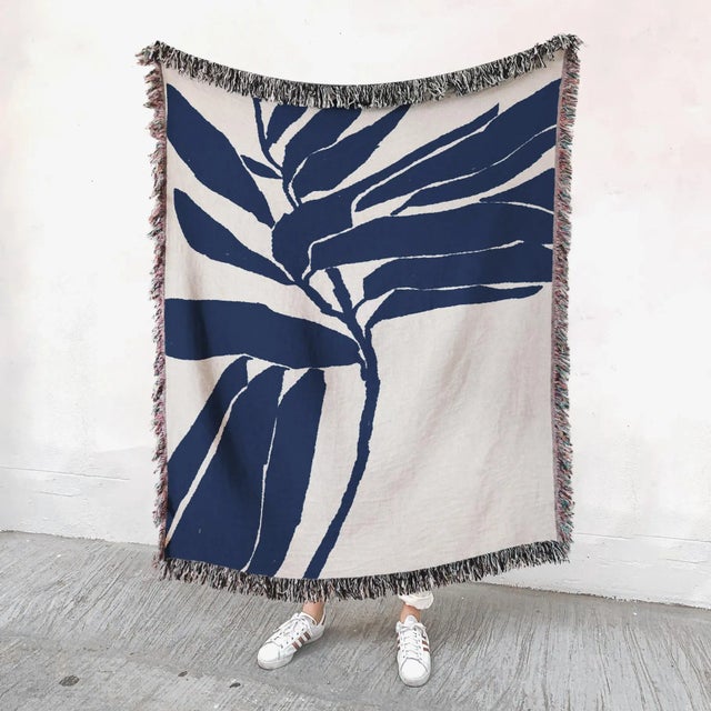 Woven throw blanket, 50"x60" (127x152cm) Abstract blue leaves botanical illustration on white background. Our premium...