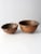 This is a pair of antique copper mixing bowls. The classic copper bowls have round bottoms for thorough mixing. They have...