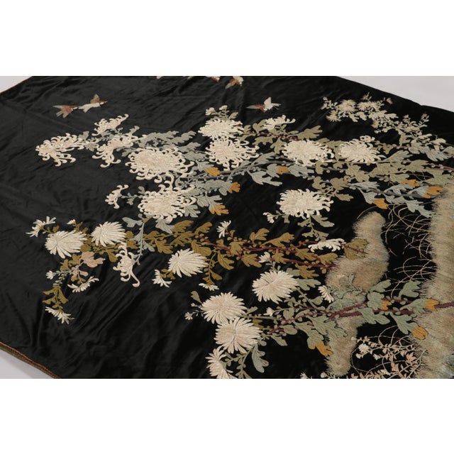 Handwoven with a luxurious embroidered silk circa 1920-1930, this 6x7 antique Chinese tapestry is a precious piece newly...