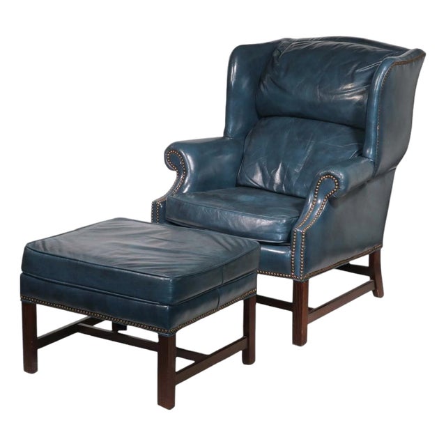 Experience Unparalleled Relaxation With a Vintage Two-Piece Classic Leather Wingback Chair & Ottoman For Sale
