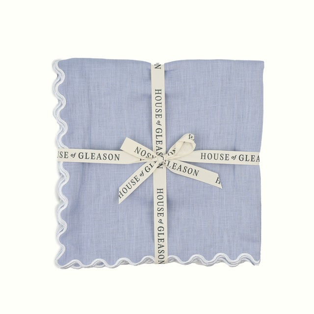 Add a little extra polish to your place settings with The Vivienne dinner napkins—where timeless linen meets a playful...
