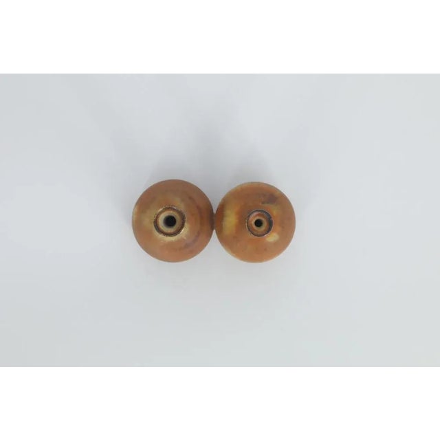 This miniature, collectible stoneware vase was designed by Gunnar Borg for the Swedish manufacture Höganäs Keramik during...