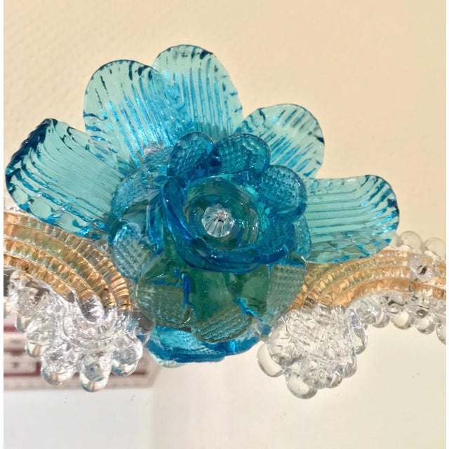 A magnificent Murano crystal mirror with gold dust embedded in the glass ornaments of the 1930s. The crystal mirror...