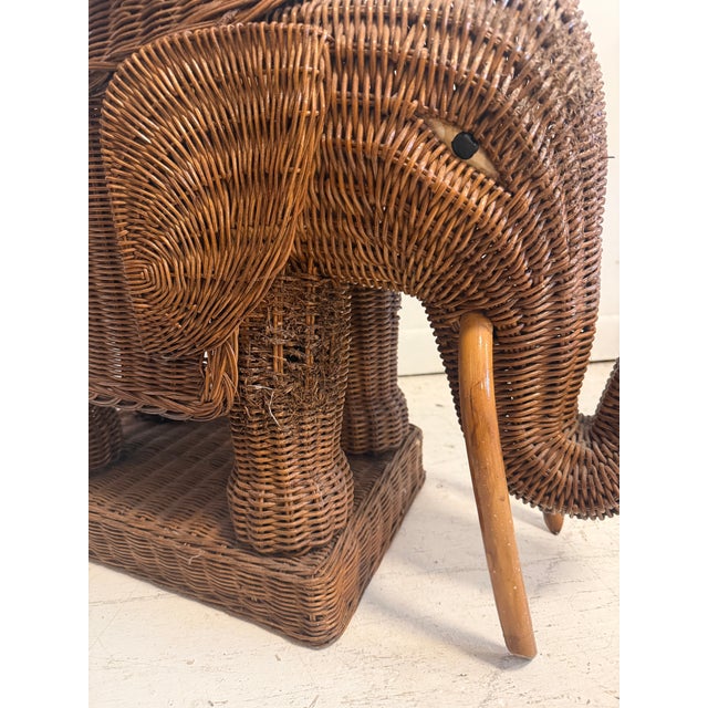 Likely a 1960s example, difficult to find unpainted. With tusks and eyes, and patina to the varnished wicker, a charming...