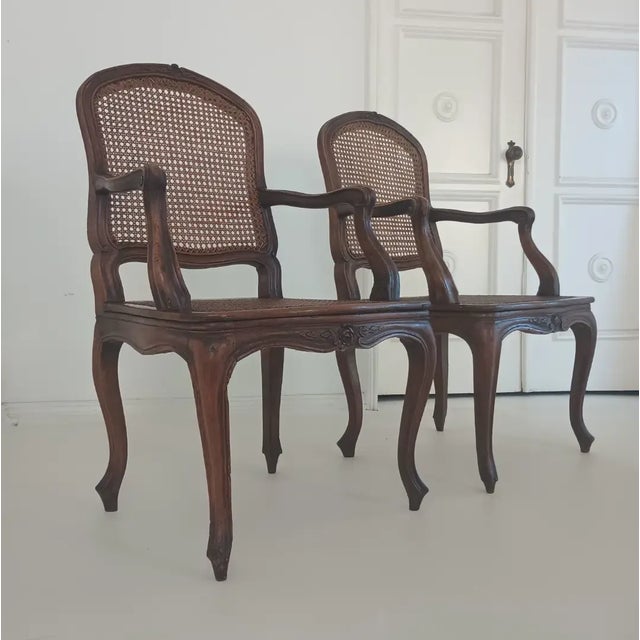 This beautiful chairs are from the late 19th hundred. They are built with walnut wood, hand carved details all around,...