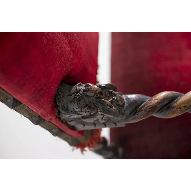 Beautiful and very rare Italian Antique Chair from the 1500s.In finely crafted walnut wood, red velvet and bangs, the...