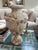 This plaster cast urn is full of stunning details. There is some chipping, consistent with the piece's age, adding to its...