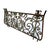 Antique 19th century wrought iron Beaux-Arts style balcony. The hand rail has been removed to add a glass or marble top...