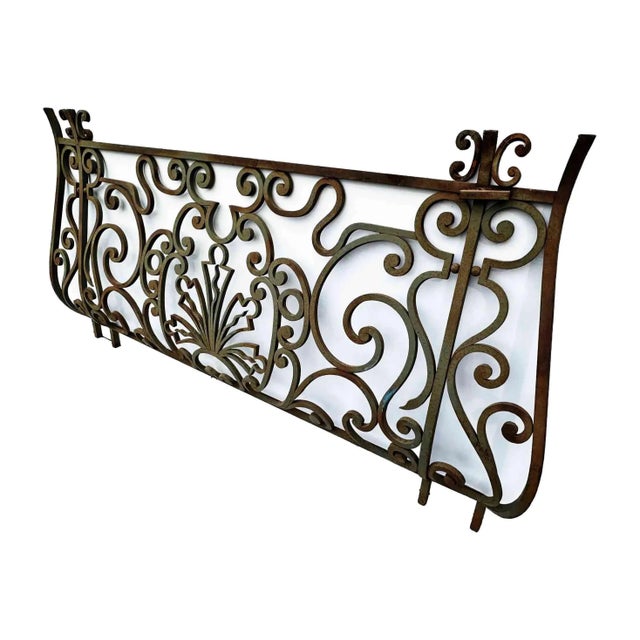 Antique 19th century wrought iron Beaux-Arts style balcony. • The hand rail has been removed to add a glass or marble top...