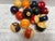 Vintage Midcentury set of sixteen boldly colorful set of pool balls. 1960s/1970s Bakelite striped and solid full set of...