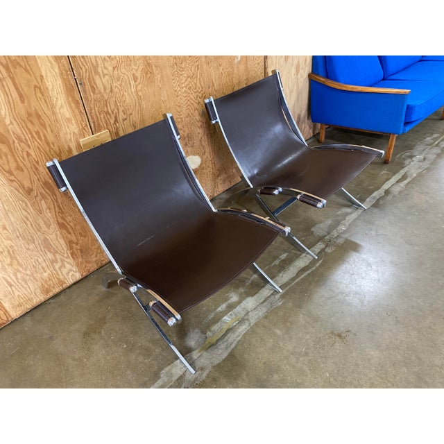 Post Modern Stainless Steel Italia Scissor brown hide leather low slung lounge pair of lounge chairs in the style of Paul...