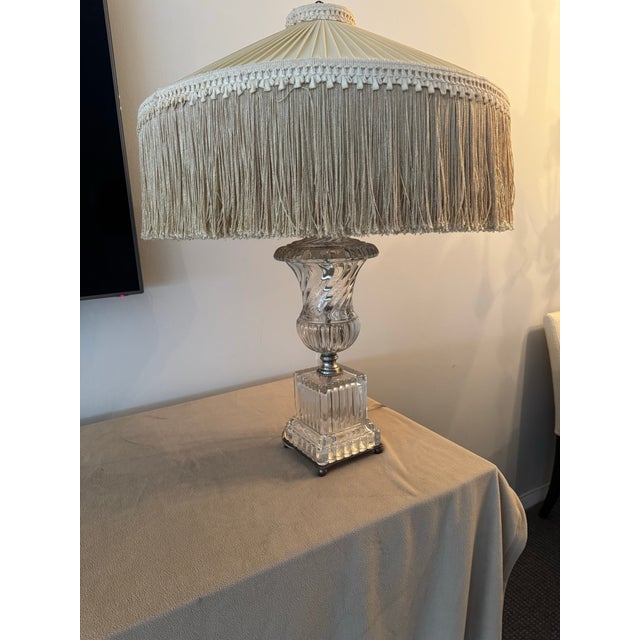 Vintage 1940 Paul Hanson baccarat style table lamp with silk fringe lampshade. Crystal body with a antique brass finish base.