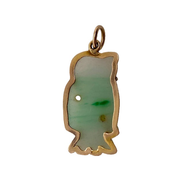 This is part of Chairish’s Fine Jewelry assortment. A fine 14 gold pendant in the form of a Lohan figure. The jadeite has...