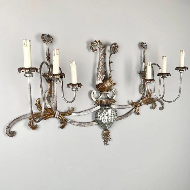 A large grand scale banci firenze silver gilt wall sconce. Standing at just over a meter wide the central crystal urn with...