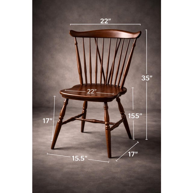 A beautifully refinished set of three Ethan Allen Windsor side chairs, showcasing classic American craftsmanship in a rich...