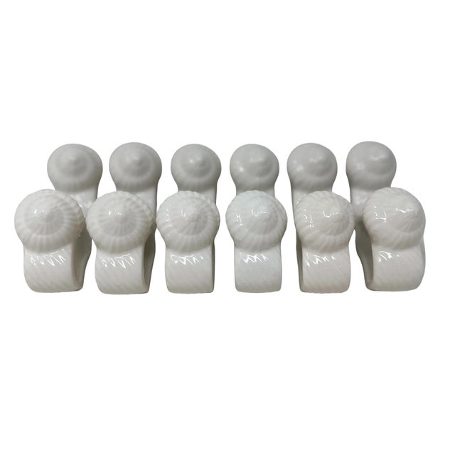 This is a beautiful set of 12 vintage white ceramic seashell napkin rings from the 1980s. Made in the Philippines, this...