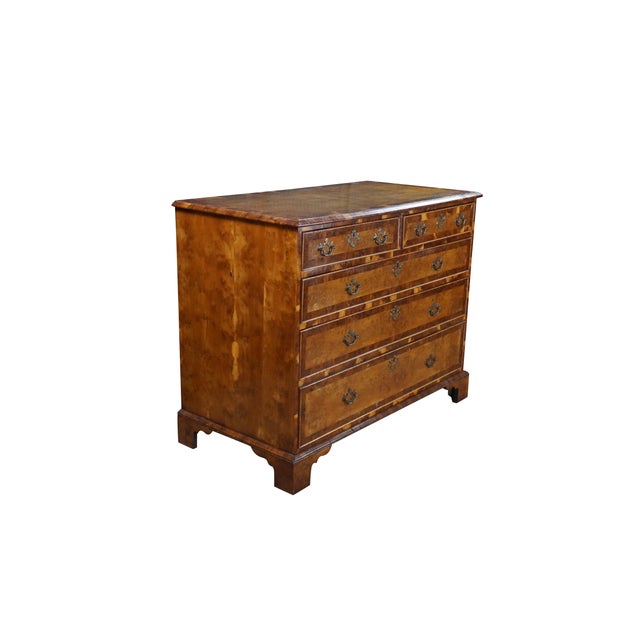 This George II style English yew wood chest features a spectacular, quad-matched oyster burl yew top surface framed by a...
