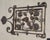 Iron side panel from a lantern with beautiful grapevine and leaf details.