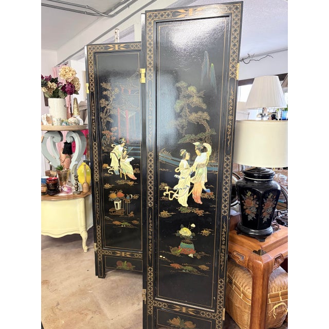 Stunning vintage Chinese black lacquer 4-panel folding screen, circa 1970s-1990s. Features intricate hand-painted...