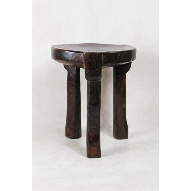 Bring authentic African craftsmanship into your home with the Hehe Iringa Stool , a timeless piece of functional art from...