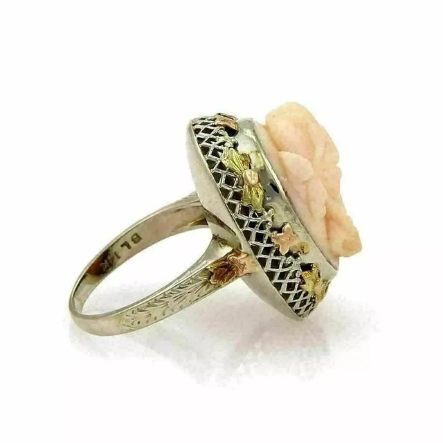 Material: 14k yellow, rose and white gold Measurement: top: 0.85" long x 0.72" wide x 0.50" high Coral: 16mm long x 14mm...