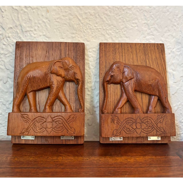 Handsome pair of vintage wooden elephant bookends. Fold down for display or storage. Most items found at Pub & Oasis are...