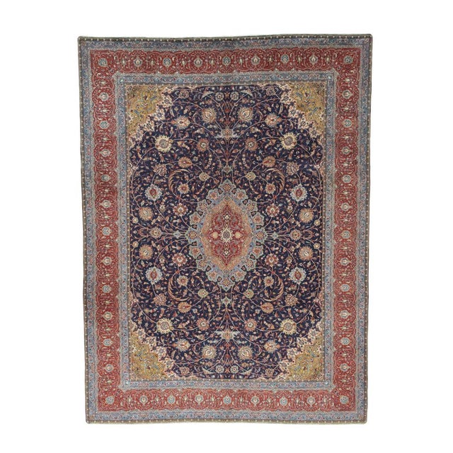 This impressive hand-knotted Sarouk cork rug captivates with its exceptional size, fine knotting, and classic medallion...