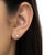 Early 21st Century 10K Yellow Gold 0.30 Cttw Round Brilliant-Cut Near Colorless Diamond Bezel-Set Stud Earrings (H-I Color, I1-I2 Clarity) For Sale - Image 5 of 6