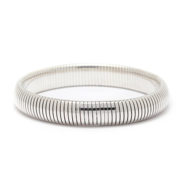 Circumference: 6.25 in (stretchy) Width: 3/4 in Weight: 22.1 dwts. / 34.4 grams Stamps: "925" SKU: B1357 A Couple Of...
