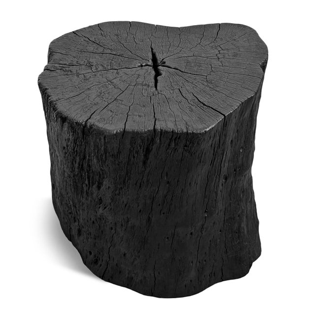 Solid lychee wood stump stool or side table. Attractive modern black finish subtly highlighting the natural wood grain....