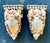 This exquisite pair of vintage wall brackets is a masterful celebration of coastal artisanal craft and "Shell Grotto"...