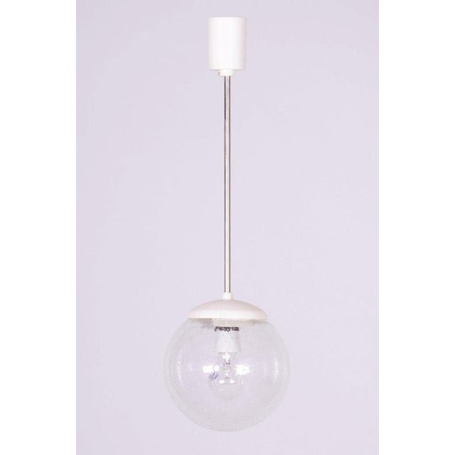 This stylish and timeless chandelier, originating from the 1960s from Czechoslovak production, represents an exceptionally...