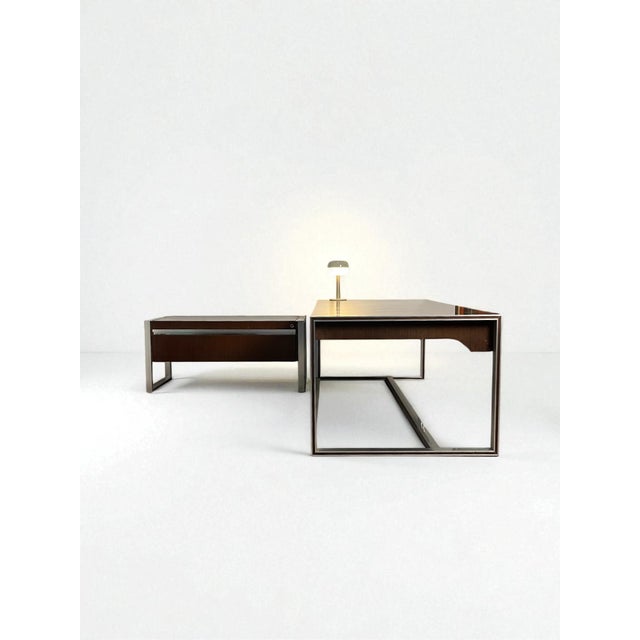 Superb executive desk from the 1970s, produced by Ligne Roset and designed by Claude Gaillard. Made of varnished rosewood,...