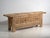 Antique carved low sideboard in pine wood, Chinese provincial furniture originating from Xinjiang and dated circa 1900....