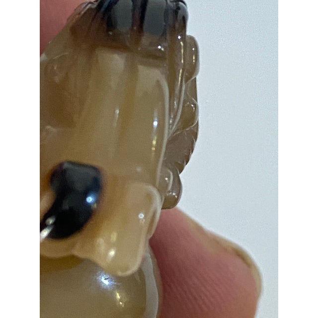 Small bell in Agathe. This object was made in China at the beginning of the 20th century. It is a small sculpture, which...