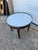Elegant French Louis XVI side table crafted in walnut with a beautifully figured veneer. It features a single drawer, a...